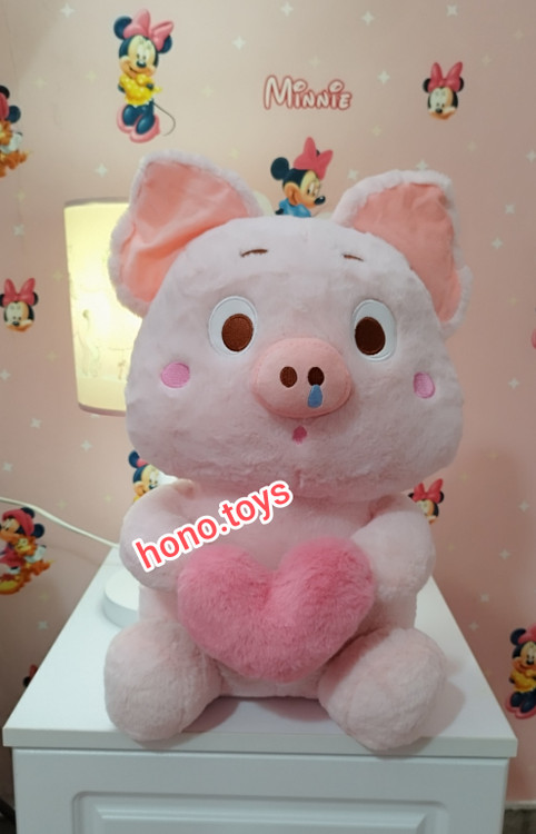 عروسک خوک قلب بدست