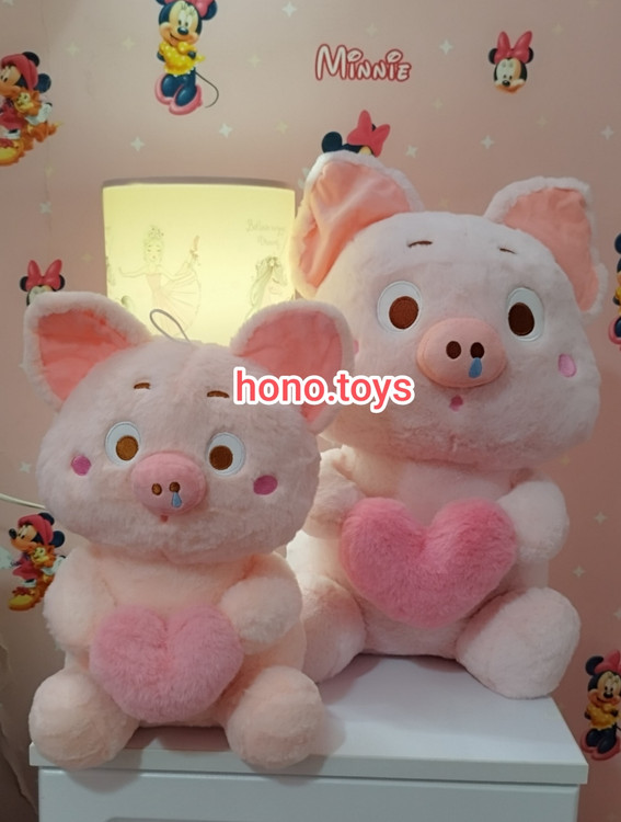 عروسک خوک قلب بدست