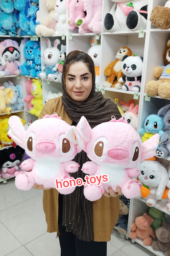 عروسک آنجل نشسته