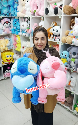 عروسک استیج و آنجل قلب بدست